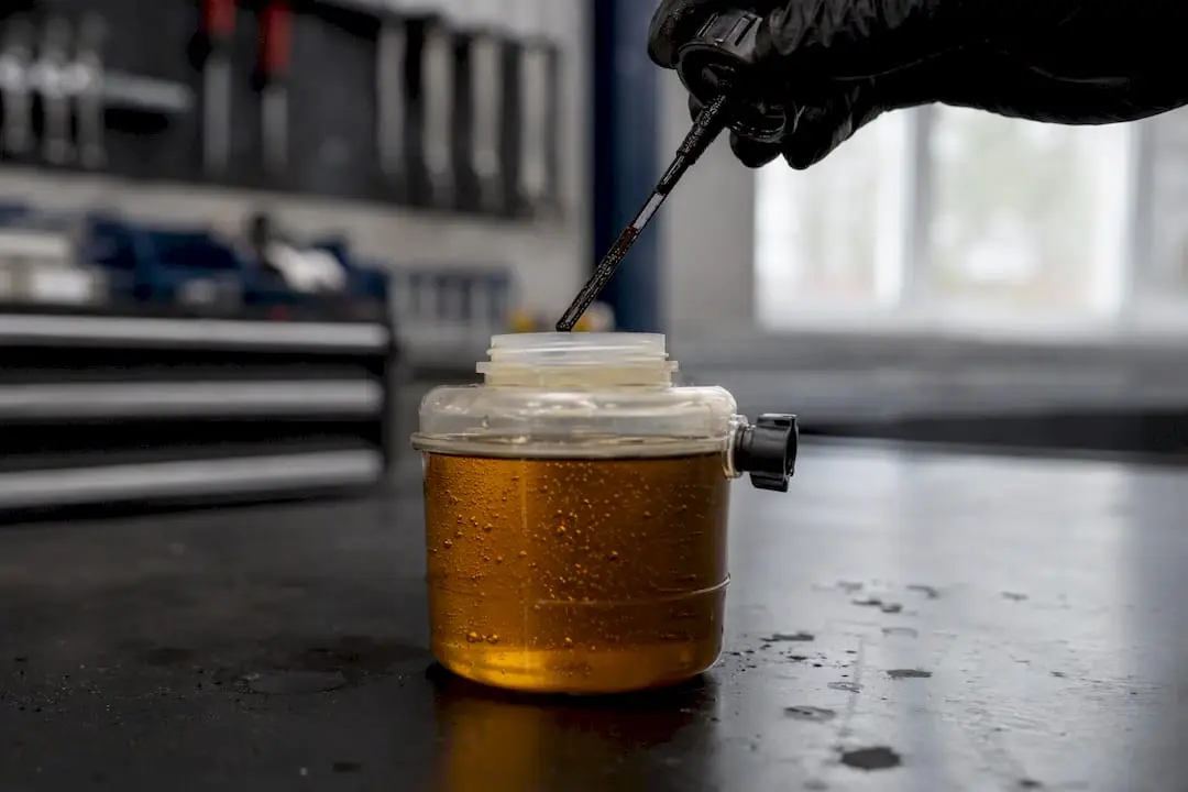 Close-up of brake fluid with moisture contamination