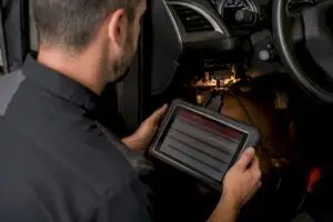 Technician reviewing vehicle live data scan